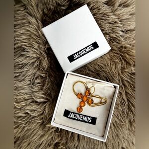 Jacquemus Gold And Amber Cross Necklace On Chord